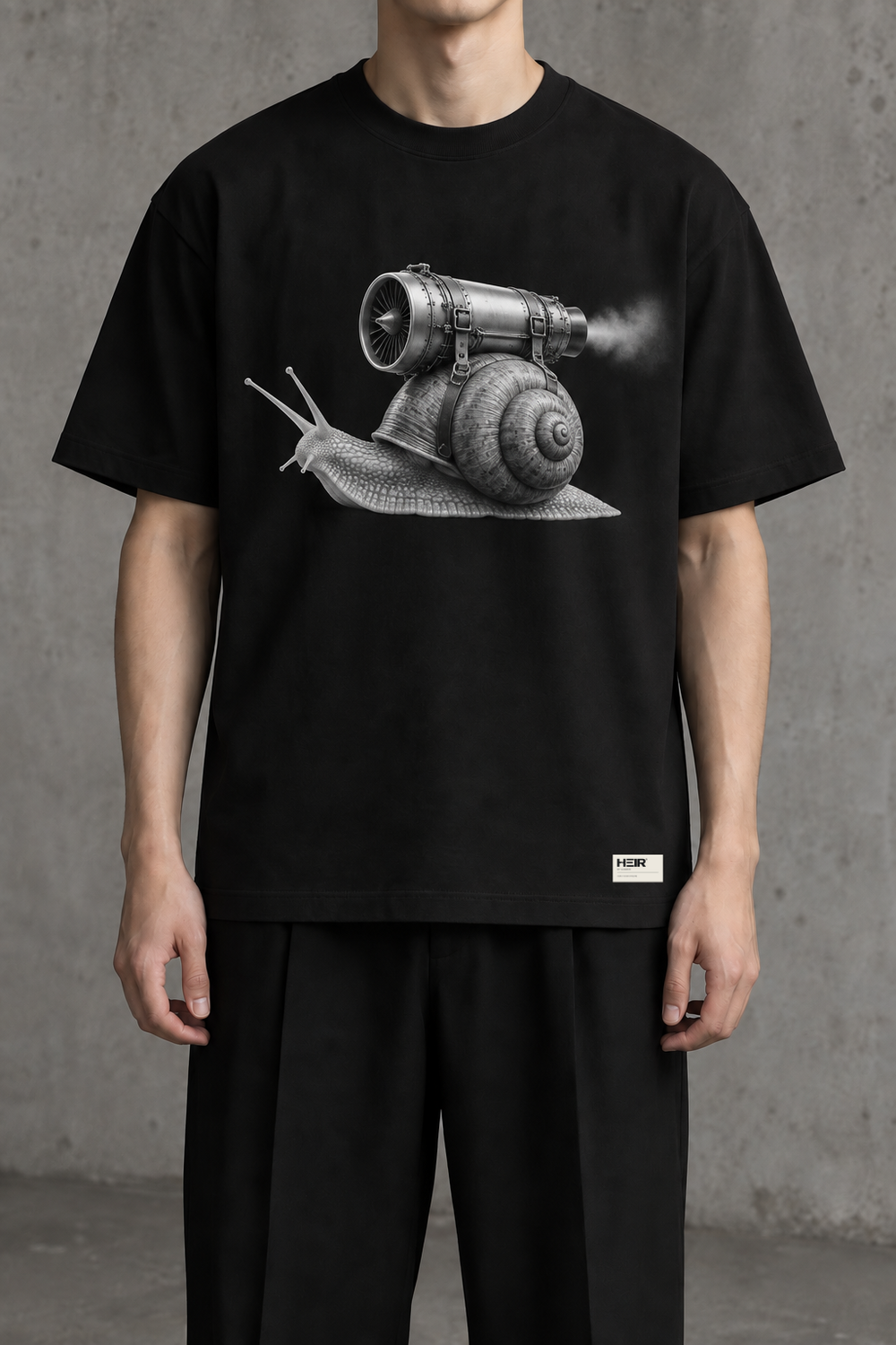 HEIR R11-03 Turbo Snail Graphic T-Shirt in Black, front design visualization with HEIR hem label. Not sample photography.
